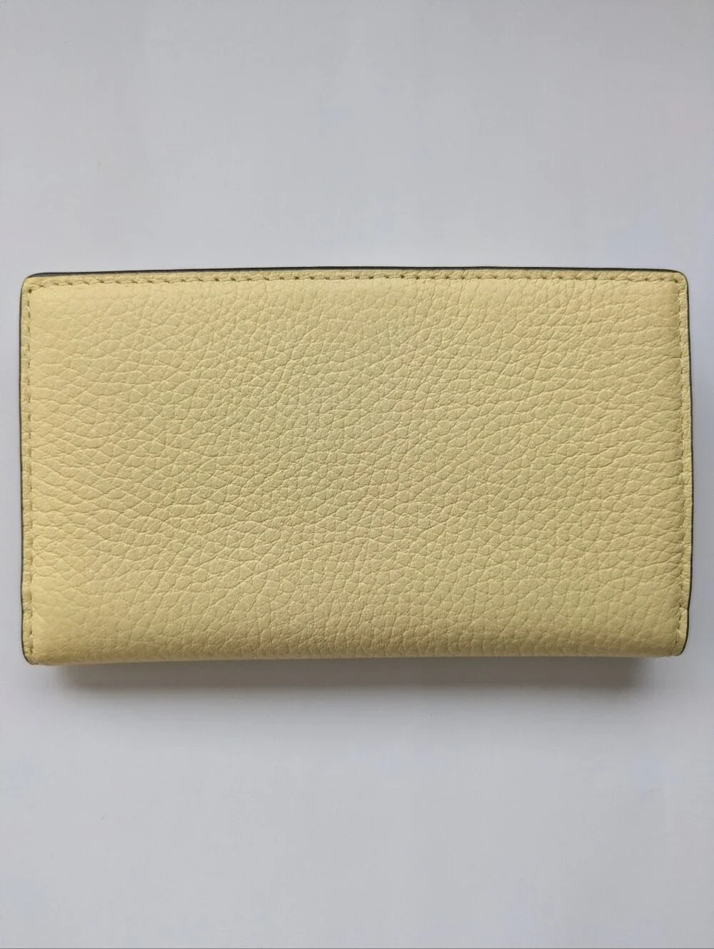 Kate Spade Small Slim Bifold in Yellow